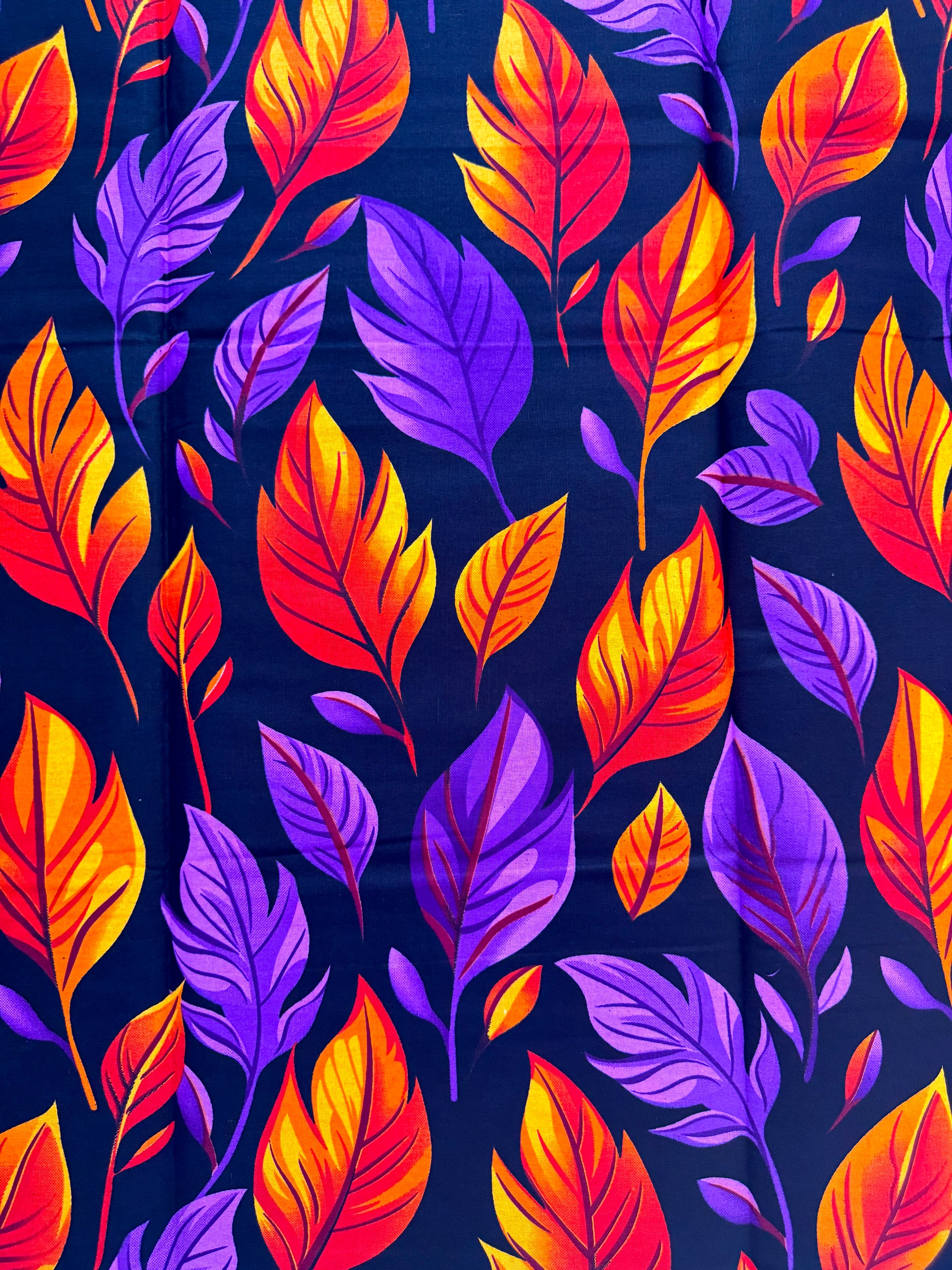 Colorful leaf pattern on a dark background