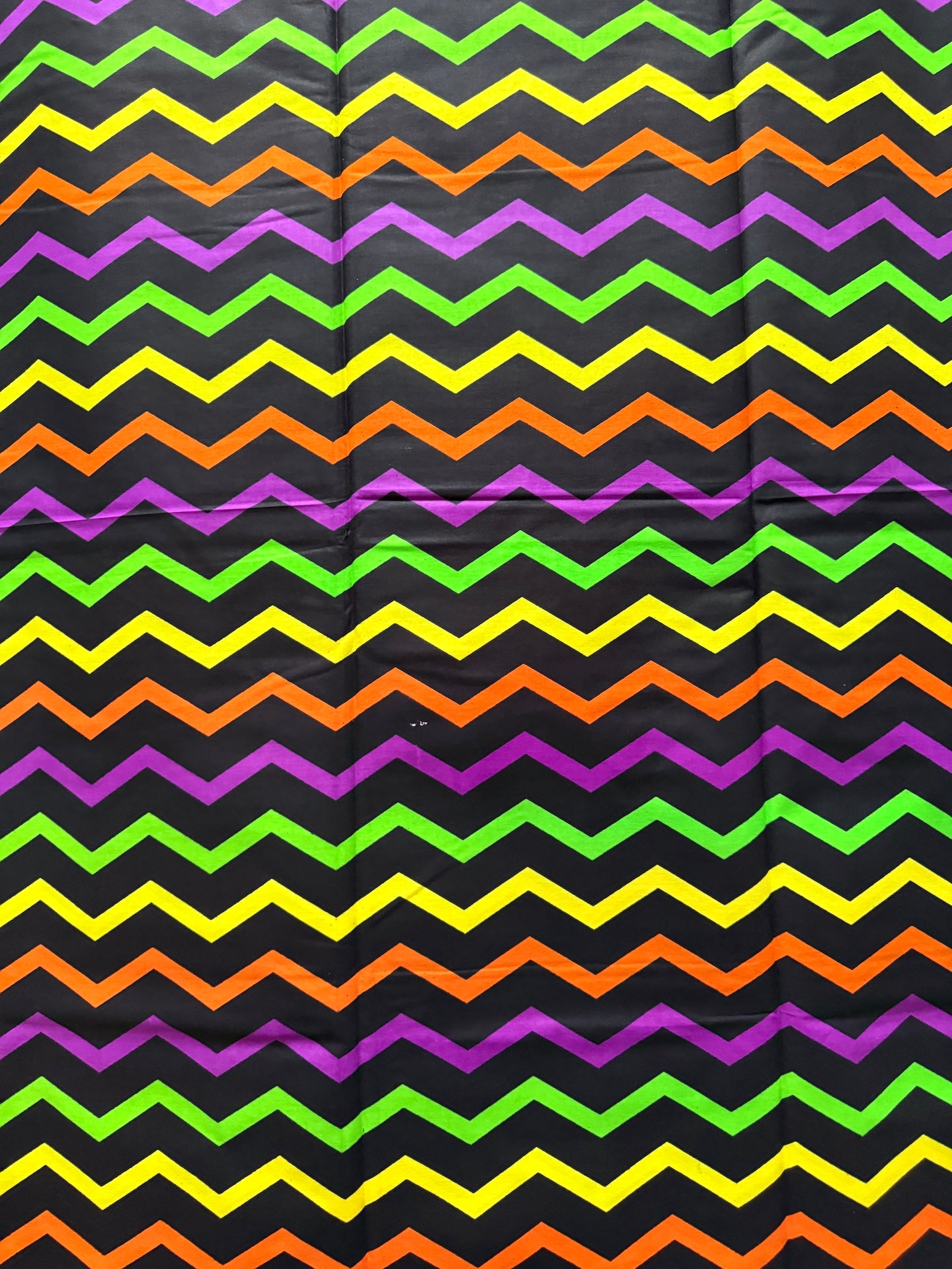 Colorful zigzag pattern on a black background