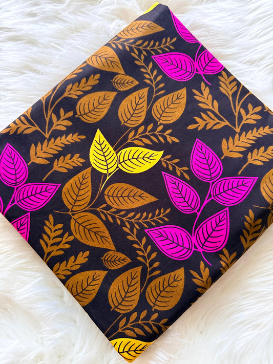 Fabric with leaf pattern on a white surface