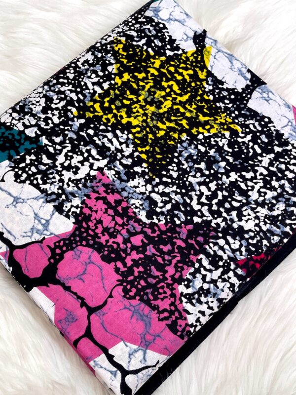 Colorful abstract patterned fabric on a white background