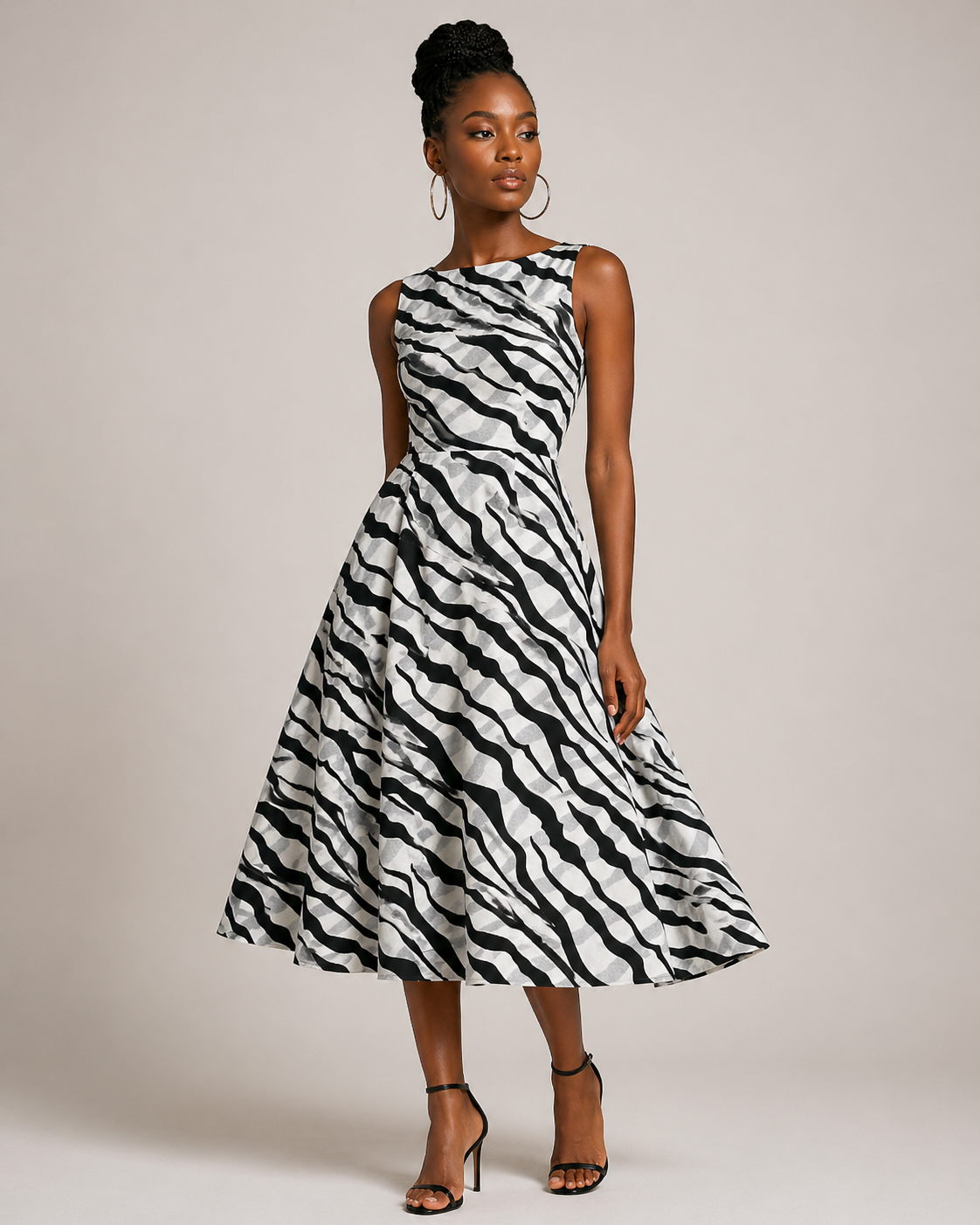 Woman wearing a zebra print dress against a plain background