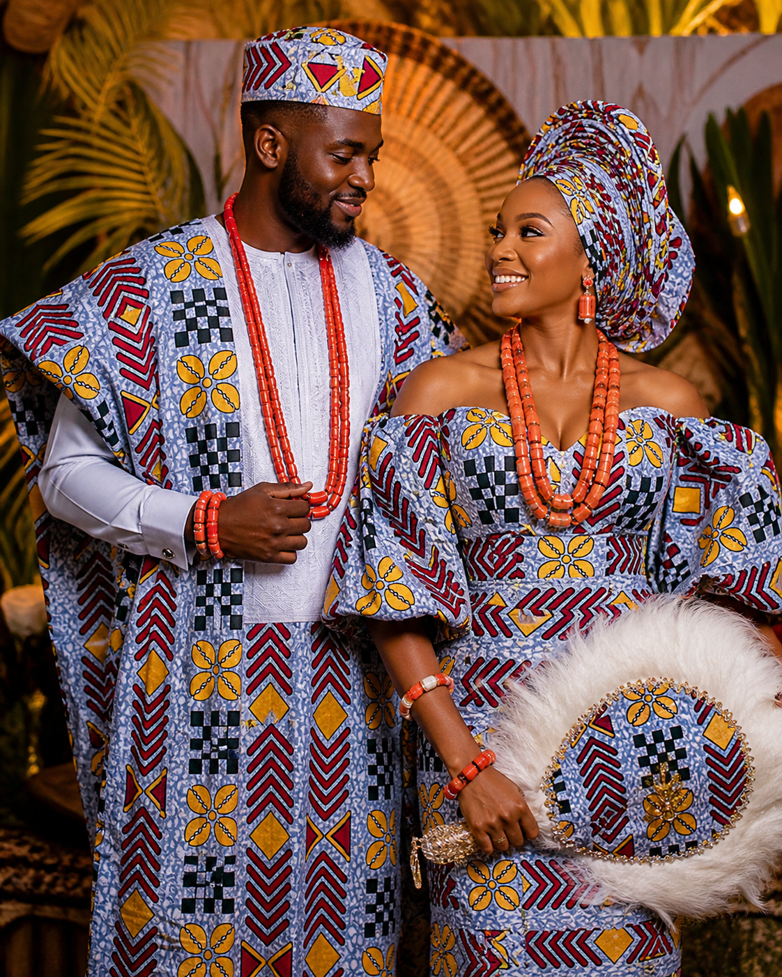 Couple in traditional attire with intricate patterns and vibrant colors.